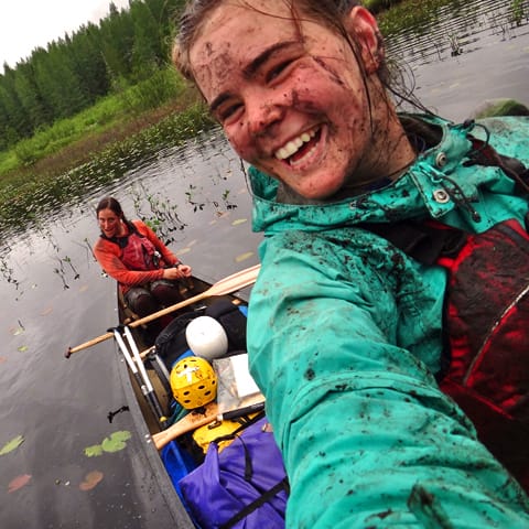 participant_canoeing-smiles_while_taking_selfie