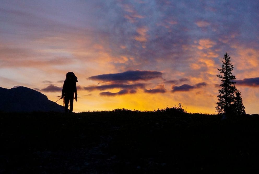 hiker silhouette sunset