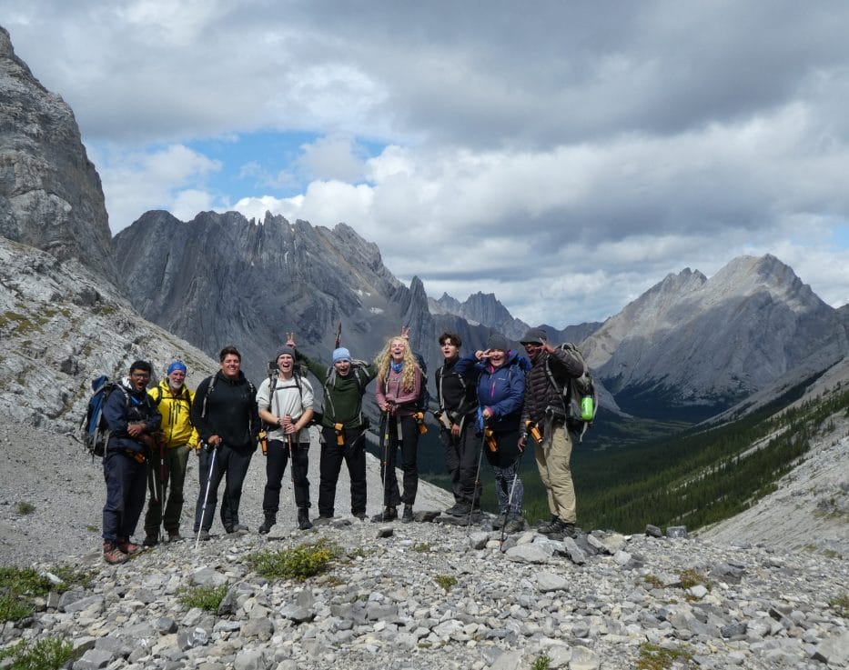 Group in front of mountains