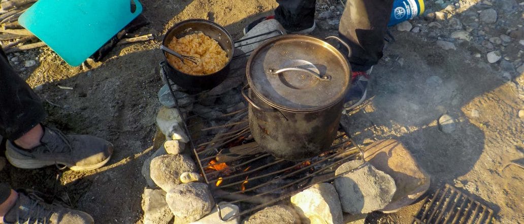 Image of pots on a campfire