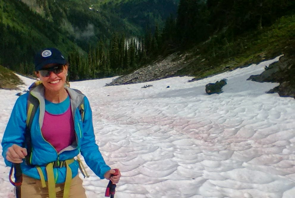Image of Anne Fitzgerald hiking in the snow