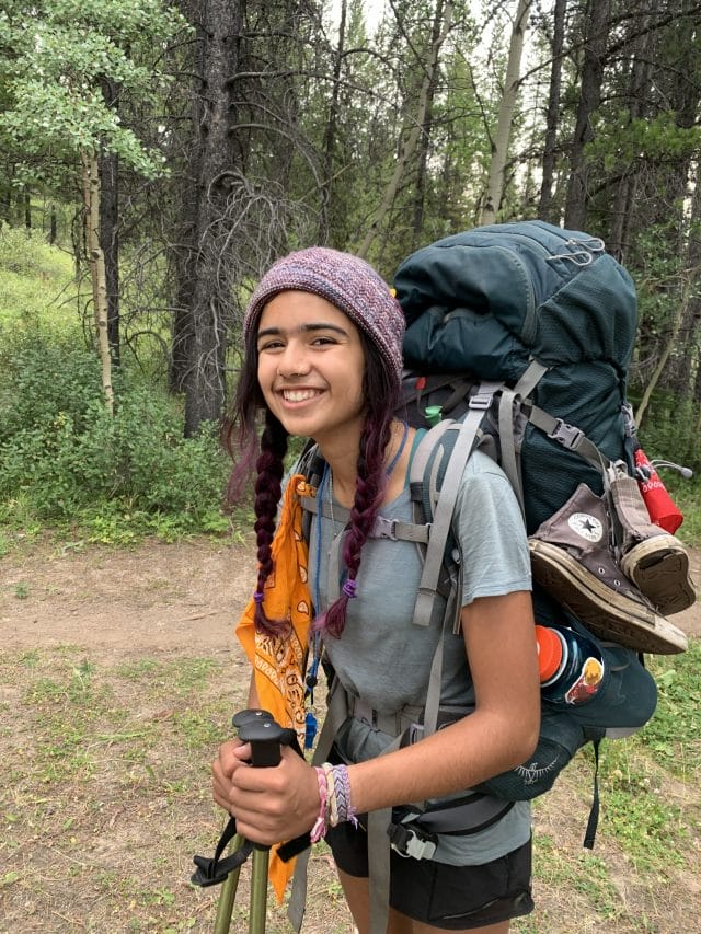 Image of a smiling backpacker