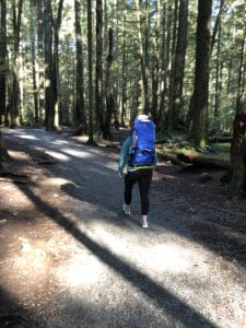 girl hiking in forest