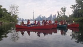 teens canoeing at the toronto islands