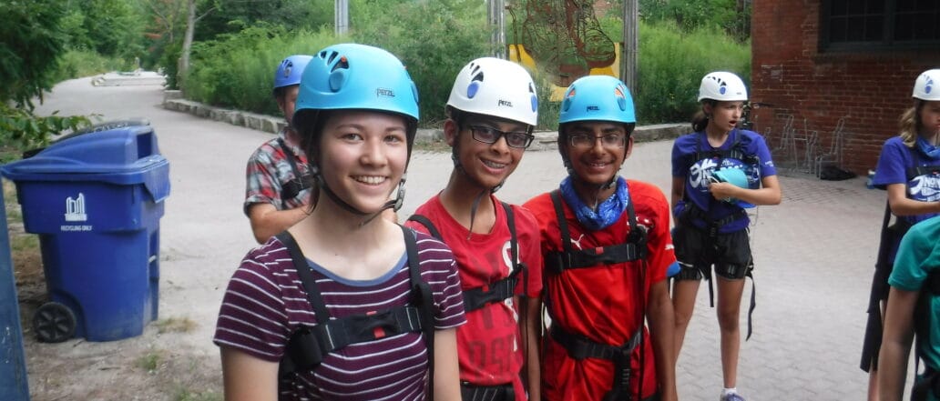 teens smiling in ropes gear