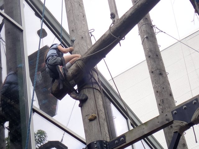 boy climbing the Don Valley Brickworks climbing tower