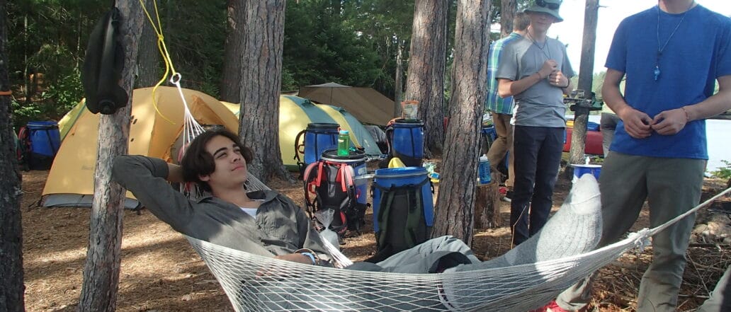 boy relaxing on hammock